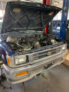 A look under the 1993 Toyota pickup hood